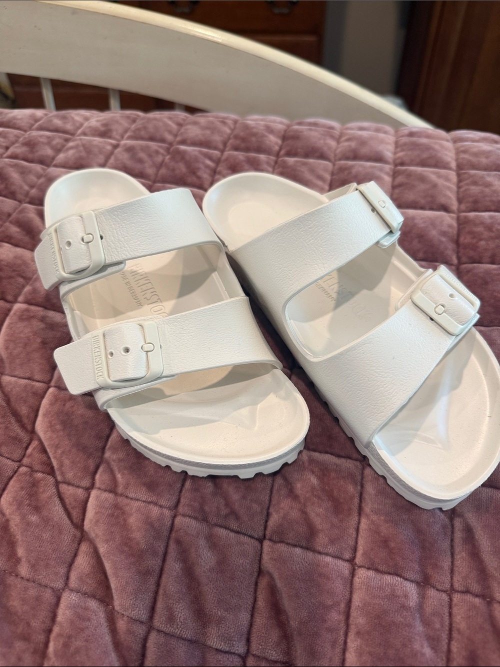 Birkenstock woman’s  White Double-Strap EVA Slide Sandals.  Color: Eggshell